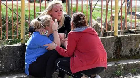 Getty family images of the victims of a nightfire in a nightclub full of people in Macedonia del Norte, wait for news of their loved ones at the Kocani General Hospital in Kocani, on March 16, 2025.