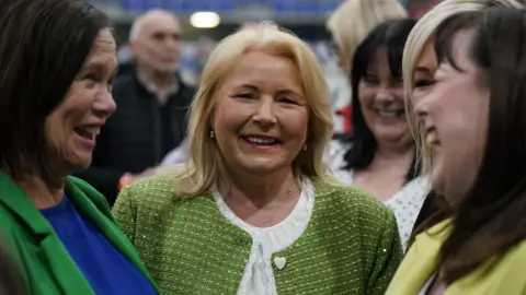 Niall Carson/PA Wire Sinn Féin's Pat Cullen celebrates with Mary Lou McDonald and Michelle Gildernew after her election in Magherafelt, during the count for the 2024 General Election. Picture date: Friday July 5, 2024.