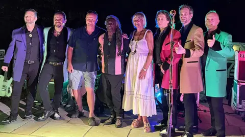 Andy and his wife Michelle with Showaddywaddy