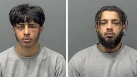 Bedfordshire Police A composite image of the mugshots of Humar and Hannan Mahmood. They both have black hair and look serious. They are wearing grey jumpers.