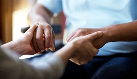 Getty Images People holding hands