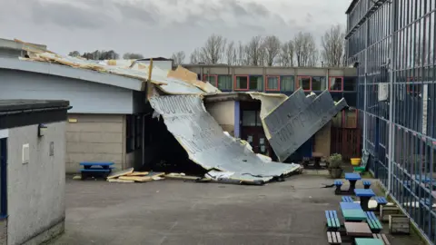 Part of the roof appears to have blown off Castle Douglas High School into a courtyard