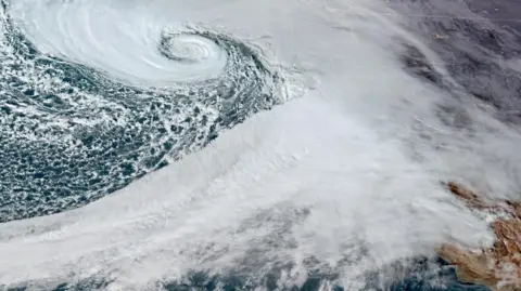 Satellite image of a bomb cyclone off the coast of the north-west US and western Canada