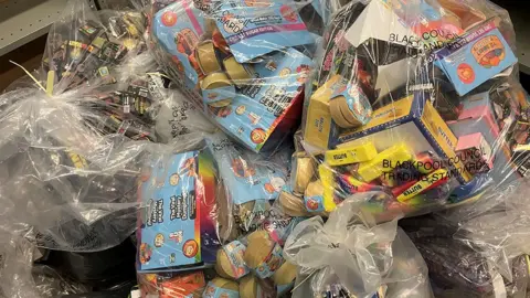 Blackpool Council Trading Standards A pile of clear plastic bags full of the fake toys and their packaging