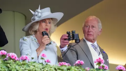 King Charles III and Queen Camilla watching the Ascot Stakes during day one of Royal Ascot.