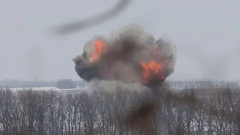 AFP via Getty Images This photograph shows the explosion after a drone strike at an undisclosed location in eastern Ukraine on January 28, 2026, amid the Russian invasion of Ukraine