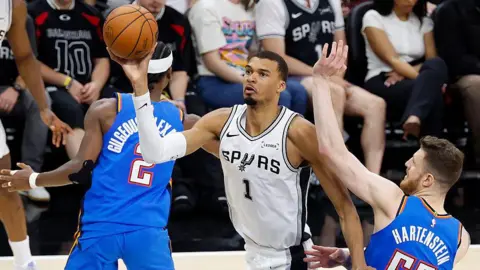 Victor Wembanyama of the San Antonio Spurs drives to the basket against the Oklahoma City Thunder