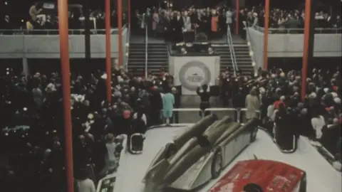 Archive image of crowds inside the National Motor Museum 