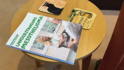 George King/BBC A Macmillan Cancer Support guide to understanding mesothelioma on a table.