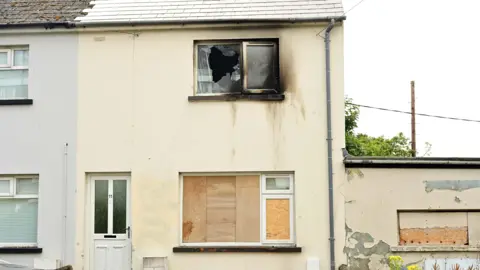 Petrol bombs damage homes in Larne attacks