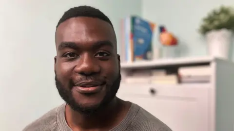 BBC Headshot of Dr Derek Adu-Sarkodie smiling