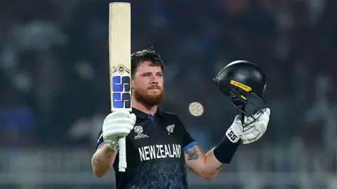 Finn Allen celebrates his century