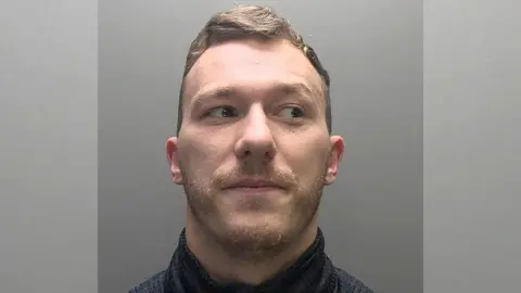 Met Police A man looking to his side 