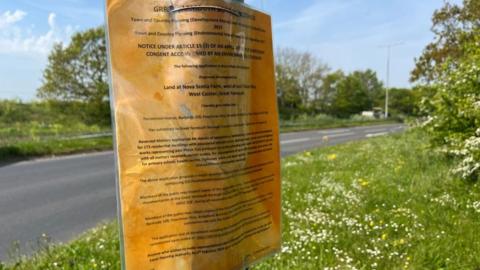 Planning notice on lamp post near A149 at Caister
