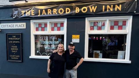 Tanith and Paul standing outside the newly rebranded Jarrod Bow Inn