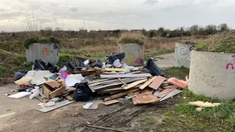 Andy Trigg/BBC Fly-tipping in Norwich