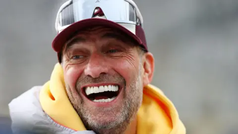 Former Liverpool manager Jurgen Klopp laughing