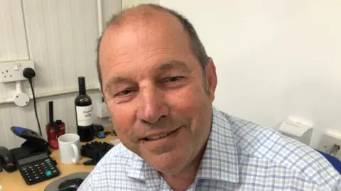 John Devine/BBC Farmer Trevor Edgley in his office in Chatteris