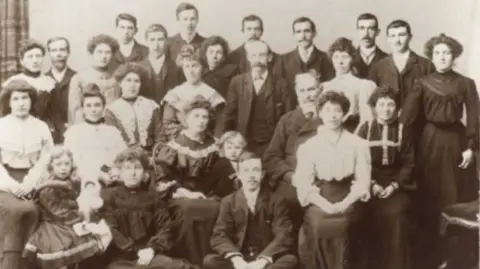 ballacreer.com An old black and white photo of a church group gathered