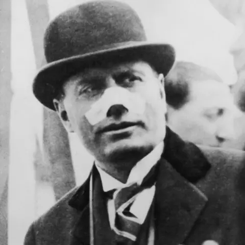 Getty Images Benito Mussolini with bandaged nose