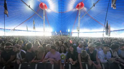A packed crowd inside the Woodsies tent