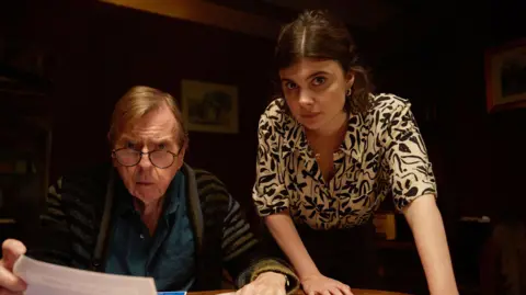 Timothy Spall and Gwyneth Keyworth in character.