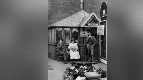 Ripley and District Heritage Trust Three people in front of a sign which reads Museum of Natural History
