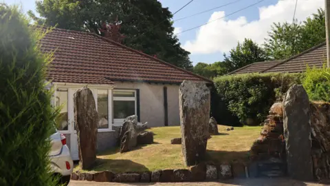 A collection of large uppright standing stones
