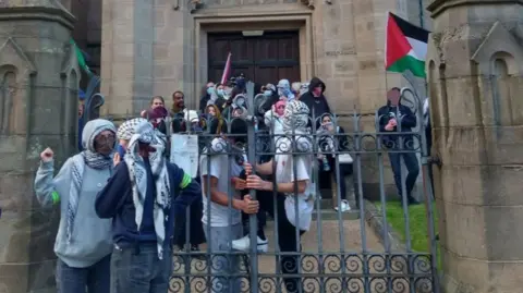 Manchester Leftist Action Protesters outside the Whitworth building