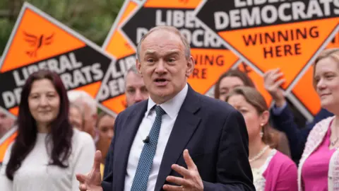 Sir Ed Davey speaking at the launch of the Liberal Democrat local election campaign in Surrey