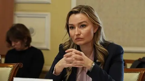 Getty Images Swedish Minister of Energy, Business and Industry Ebba Bosch looks serious in a meeting. 