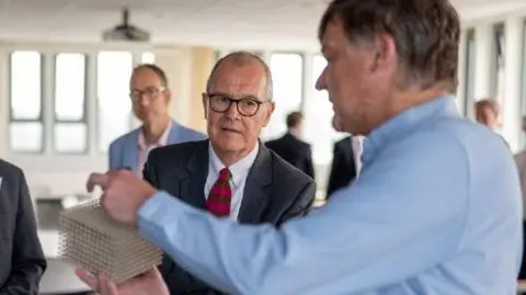 University of Exeter Professor Alastair Hibbins (right), who will lead the MetaHub collective, with Lord Vallance at the University of Exeter