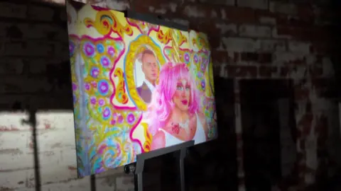 One of Gil Mualem-Doron's artworks at the battery, which is being illuminated by a torch, inside one of the battery's tunnels.