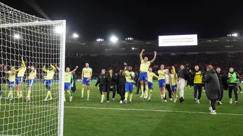 Getty Images Southampton Football Club players celebrate winning an FA Cup Quarter Final tie against Arsenal at St Mary's Stadium