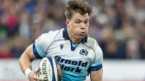 Huw Jones playing for Scotland