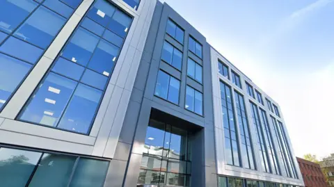 The front of Slough Borough Council's building on a clear day, photographed at an angle.