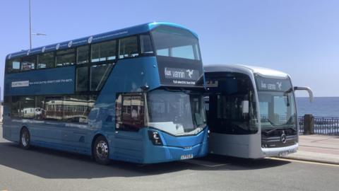 Two electric buses