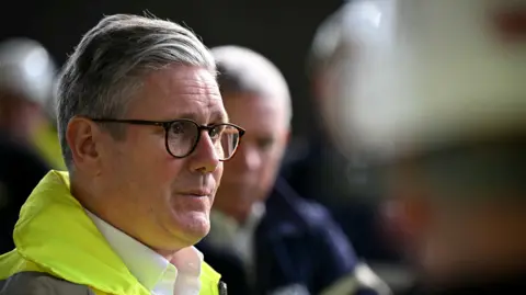 Reuters Keir Starmer wearing a hi-vis jacket 