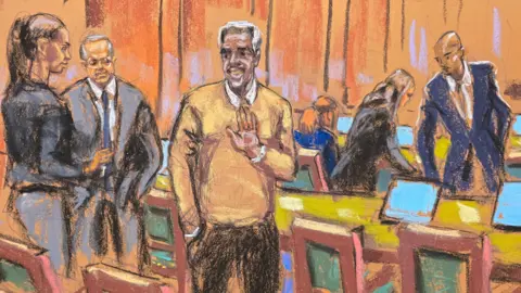 Sean "Diddy" Combs waves to family in a court sketch
