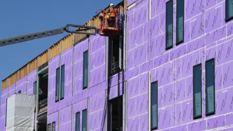 East Suffolk and North Essex NHS Foundation Trust, The Dame Clare Marx Building, at Colchester Hospital, that has been "topped out"