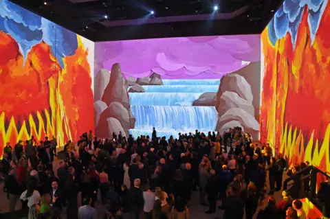 Getty Images A general view of the atmosphere at the Gala Opening of "David Hockney: Bigger & Closer (not smaller & further away)" at Lightroom on February 21, 2023 in London, England.
