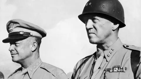 Supreme Allied Commander General Dwight Eisenhower (left) and Gen George Patton