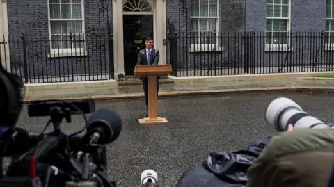 Reuters Rishi Sunak announces he is calling a general election outside 10 Downing Street