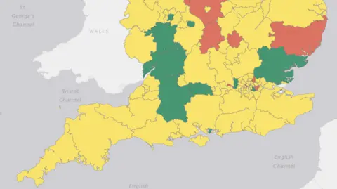 A map showing the south of England, broken up by different regions. Gloucestershire and Wiltshire are coloured in green, while the surrounding regions are mostly amber while three are red. 