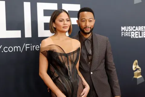 Getty Images Chrissy Teigen and John Legend
