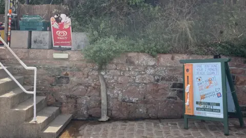 Government of Jersey Close up image of the beach clean board