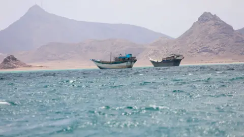 Boats float near the coast of Bab el-Mandeb, Yemen April 2, 2026.
