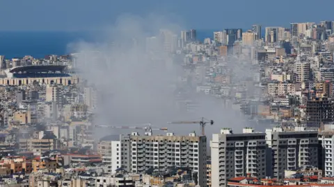 Smoke rises from the southern suburbs of Beirut, Lebanon, following an Israeli strike (2 March 2026)