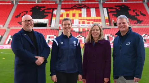Getty Images (L-R) Sunderland City Council Leader Graeme Miller, Former England Rugby player Sarah Hunter, Sarah Massey managing director of the local operating company and Minister for Sport Stuart Andrew inside The Stadium of Light.