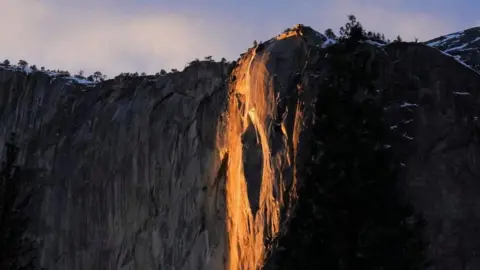 Sunlight hitting Yosemite's El Capitan waterfall.
